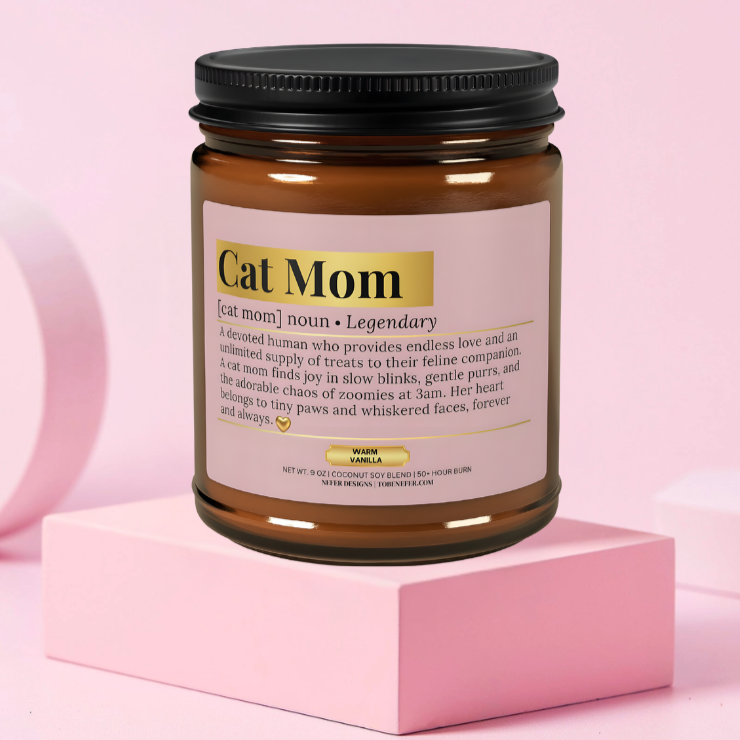Cat Mom Dictionary Definition Candle - A humorous soy candle label describing a cat mom as a 'legendary' human who adores purrs, 3 AM zoomies, and tiny paws. Warm vanilla scent in amber jar.