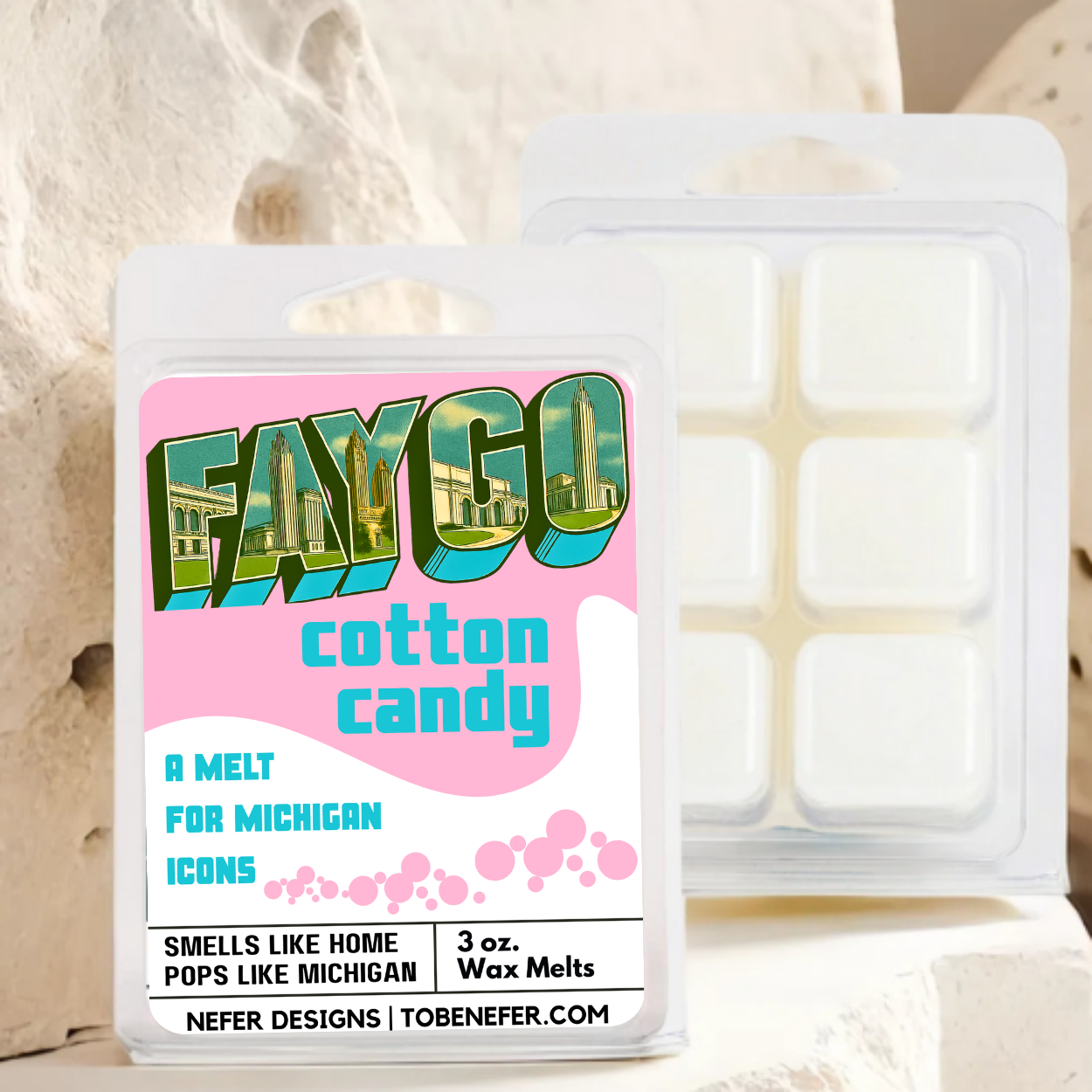 Faygo cotton candy wax melt packaging with pink label and clear container.