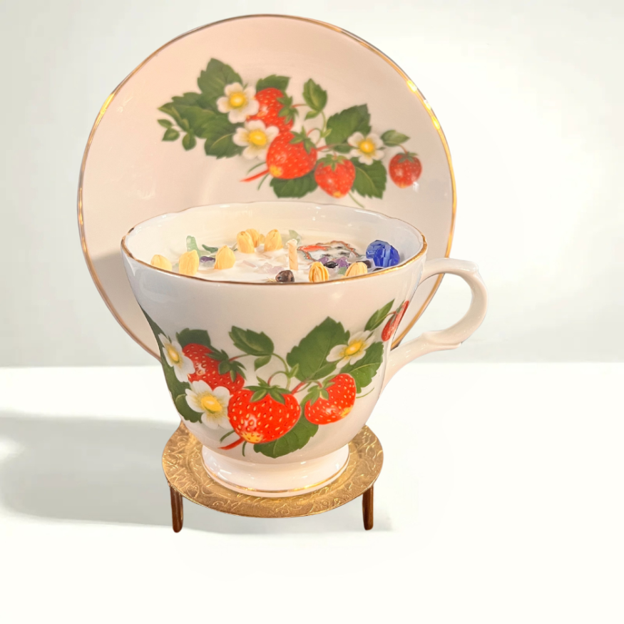 Beautiful mid-century teacup with a vibrant strawberry and greenery pattern, crafted in Staffordshire and reflecting the charm of British porcelain.