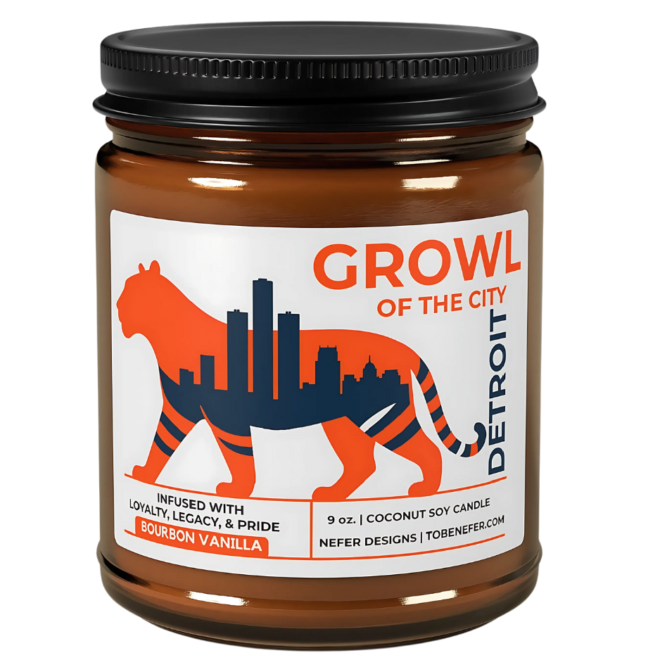Candle jar with 'Growl of the City' label featuring a tiger and cityscape design.