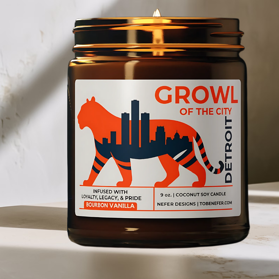 Candle jar labeled 'Growl of the City Detroit' with a tiger design on a neutral background