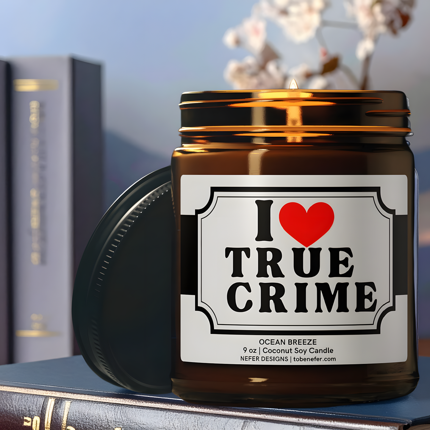 Hand-poured true crime candle in amber glass jar, styled beside vintage novels.