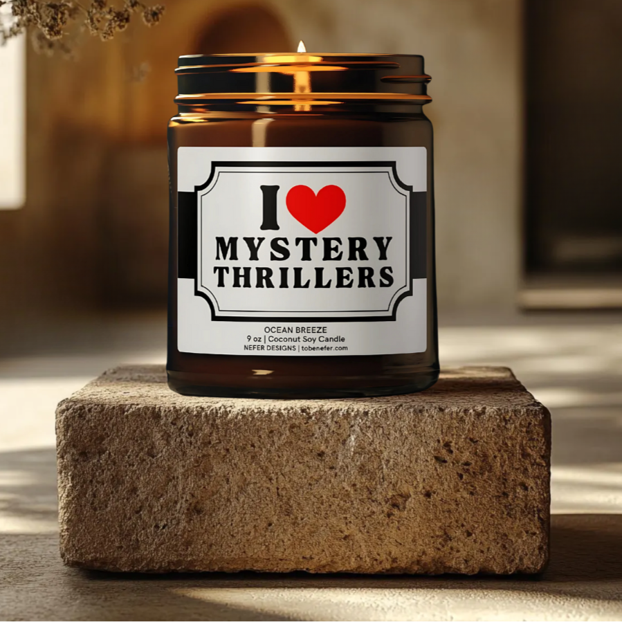 Mystery Thriller Scented Candle - Sleek black jar with 'I Love Mystery Thrillers' label, glowing flame