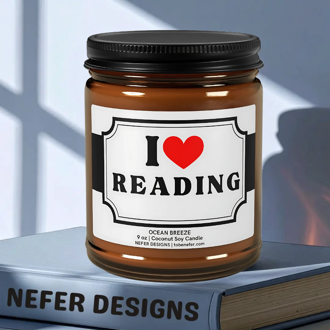 Ocean Breeze scented candle in amber jar with ' I love Reading' label by Nefer Designs
