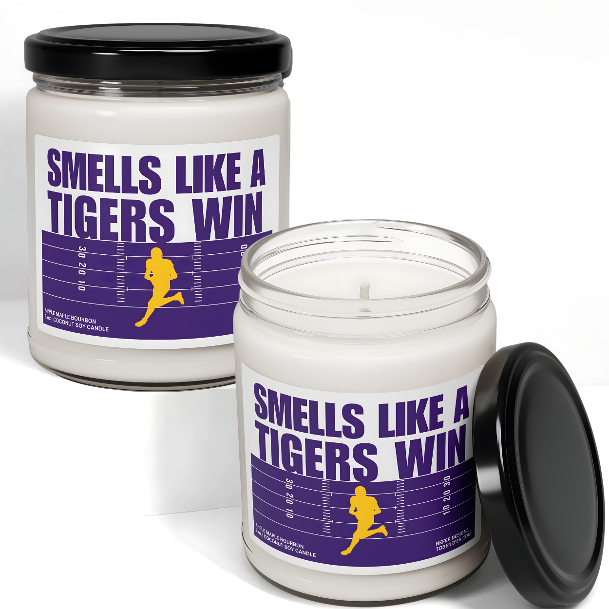 Louisiana tigers game day candle with the purple and yellow team colors on the label saying smells like a tigers win