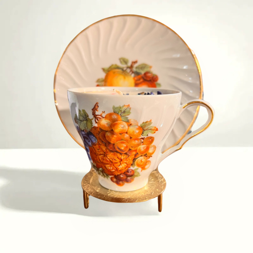 Vintage Old Nuremberg teacup and saucer with intricate German porcelain design, showcasing traditional craftsmanship and delicate motifs.