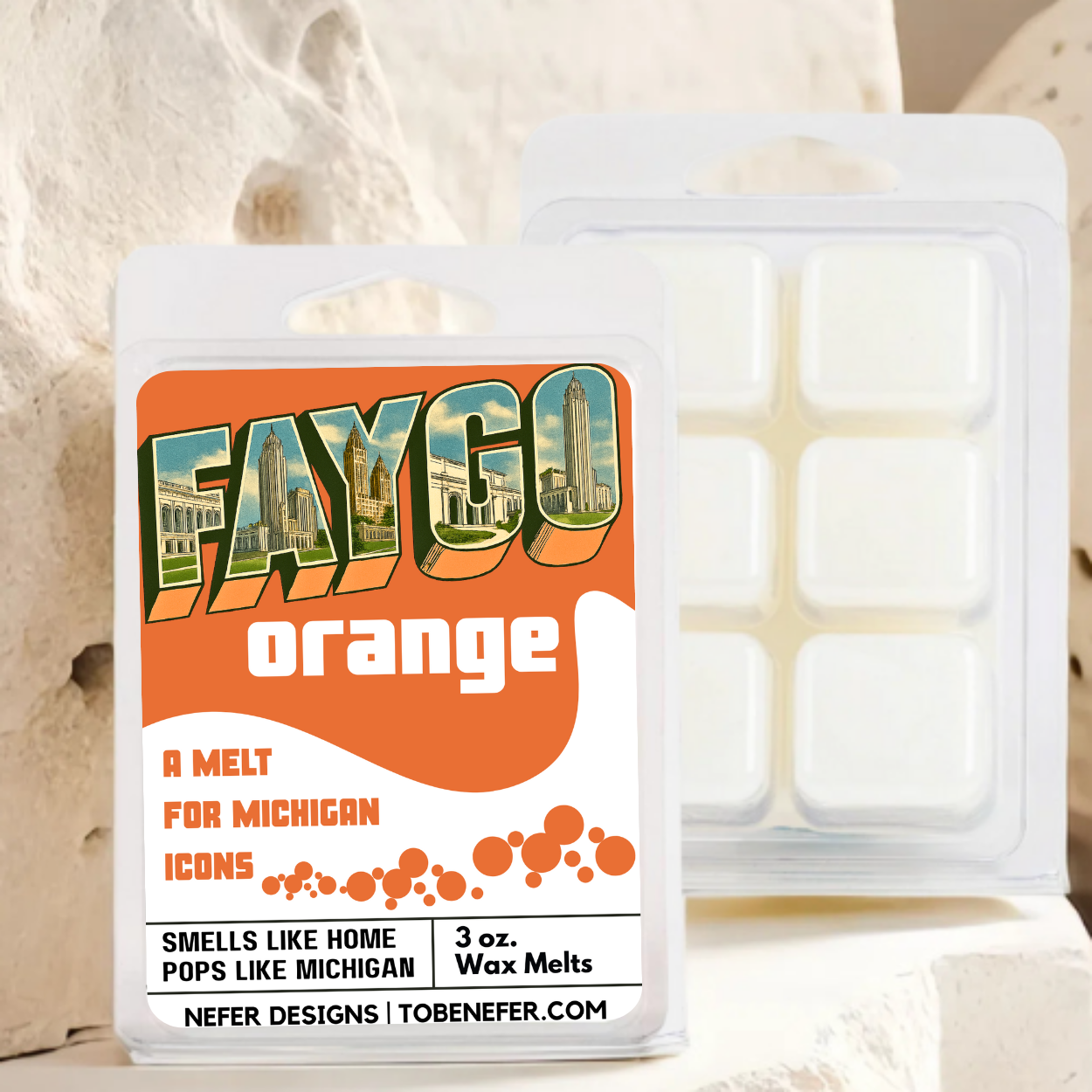 Wax melt packaging with 'FAYGO orange' branding on a textured background