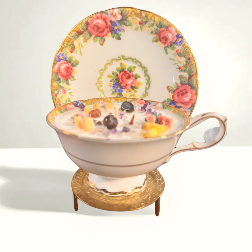 Vibrant English teacup and saucer featuring the Tapestry Rose pattern with soft pink roses and greenery, crafted from fine bone china by Paragon