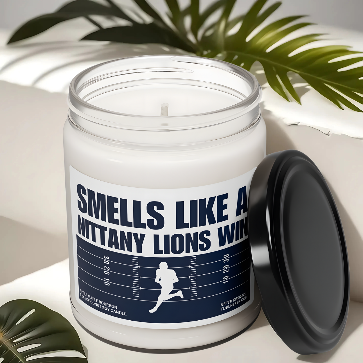 The Pennsylvania State University Nittany Lions Football Game day candle with the label showing the team colors