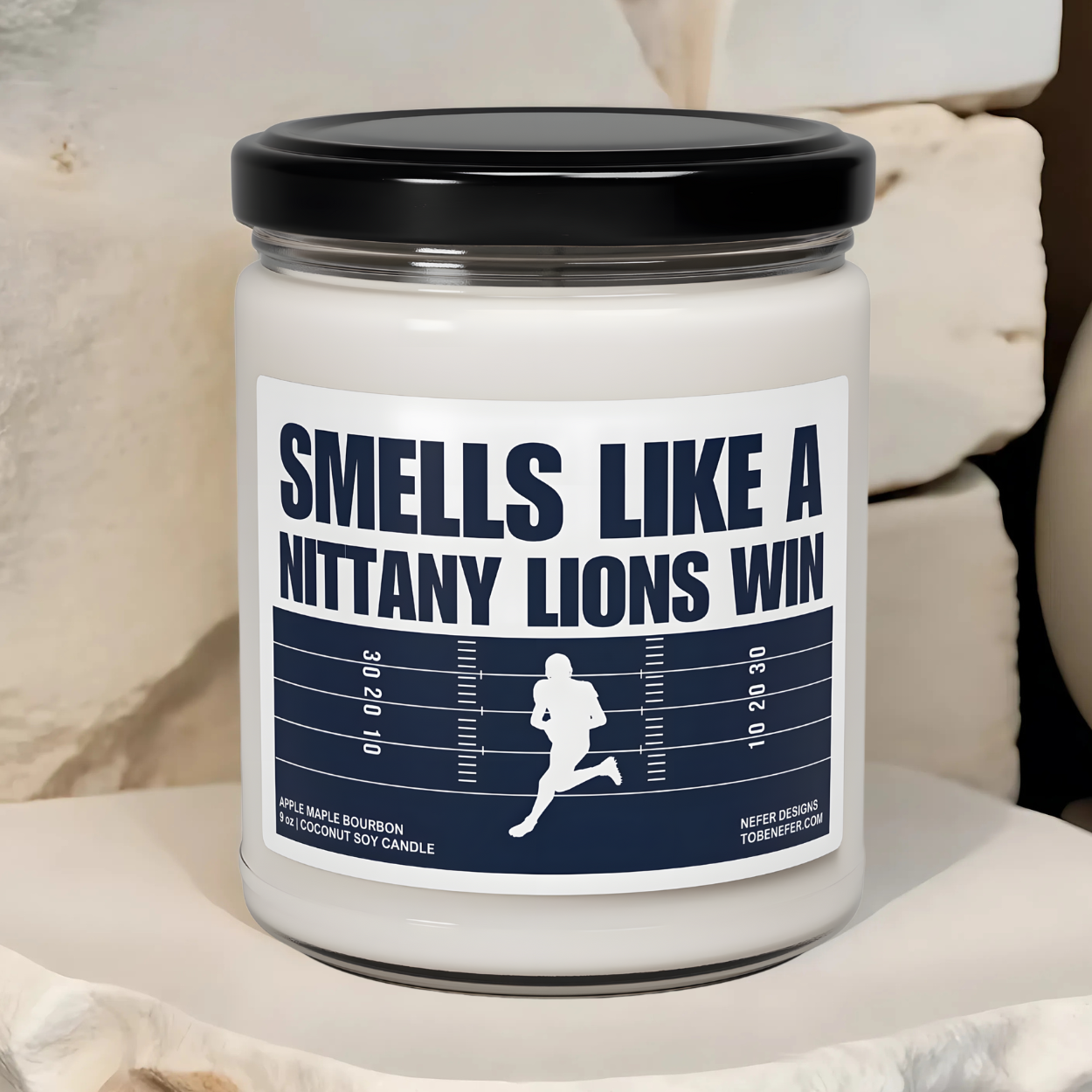 The Pennsylvania State University Nittany Lions Football Game day candle with the label showing the team colors