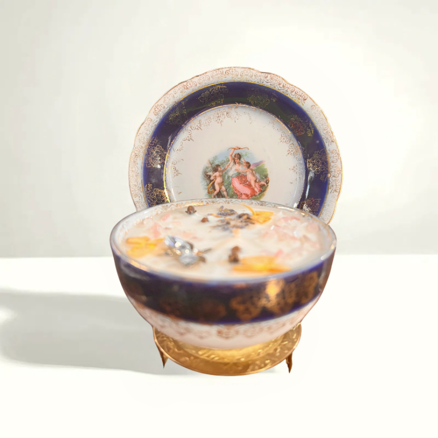 A refined piece of German porcelain featuring intricate floral patterns and gold accents, showcasing the craftsmanship of the renowned Rosenthal company.