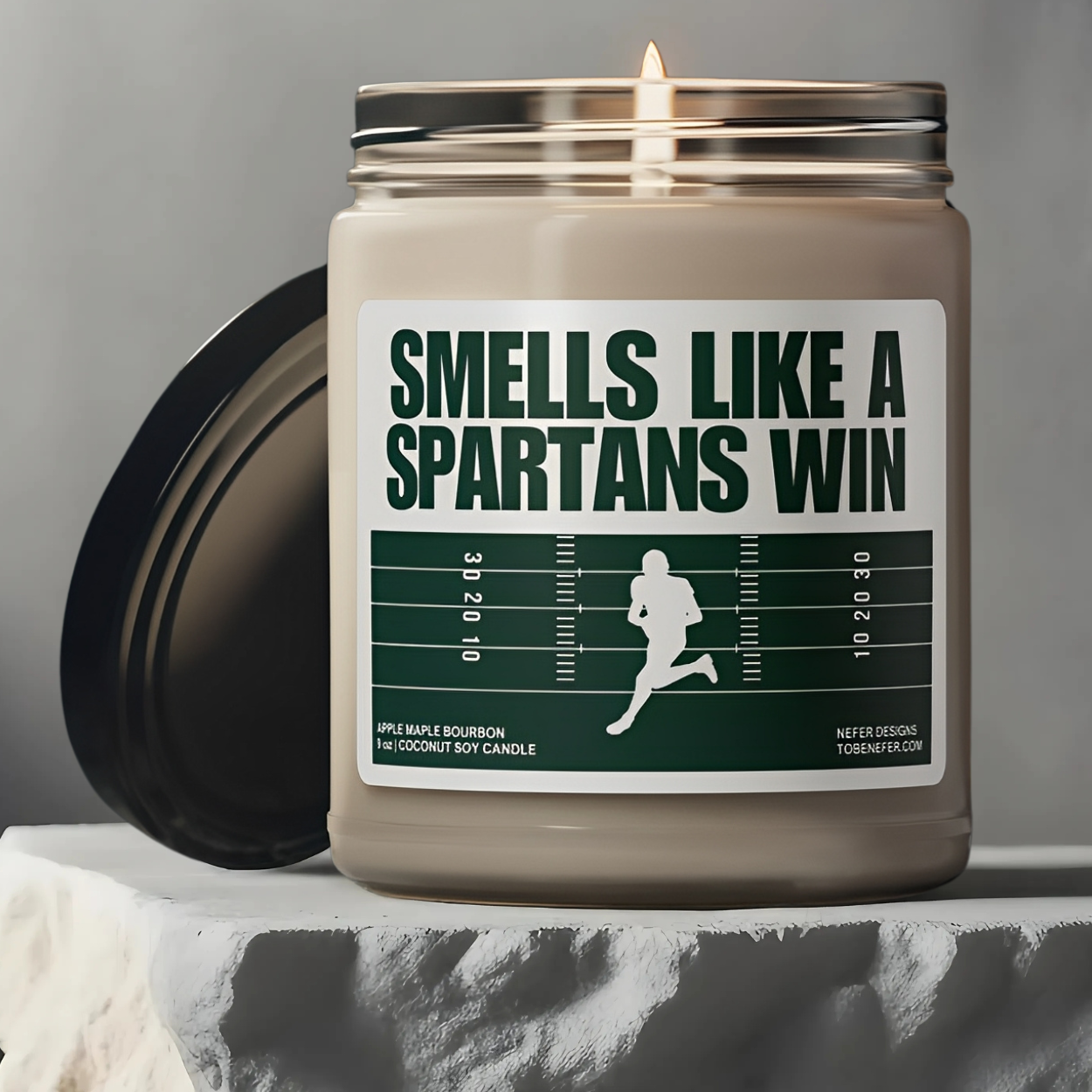 Smells Like a Spartan Win Candle – Michigan State Game Day Candle in Green and White Perfect for Fans, Tailgates, and Gifts.