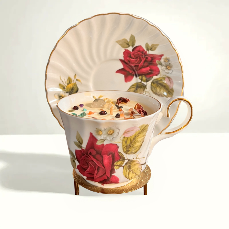 Victorian-style Staffordshire Crown teacup and saucer with intricate floral patterns and fine English porcelain craftsmanship