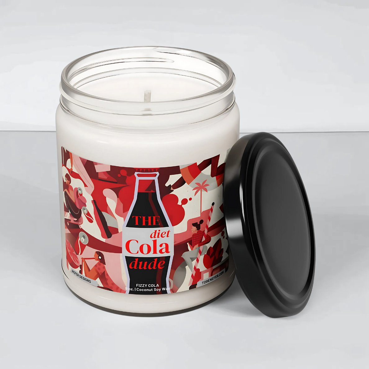 A 9 oz Diet Cola Dude Soda Pop Soy Candle in a repurposed soda can, featuring a bold red design. Hand-poured with a coconut and soy wax blend, it fills the air with the nostalgic scent of classic cola. A fun gift for soda lovers and vintage fans.