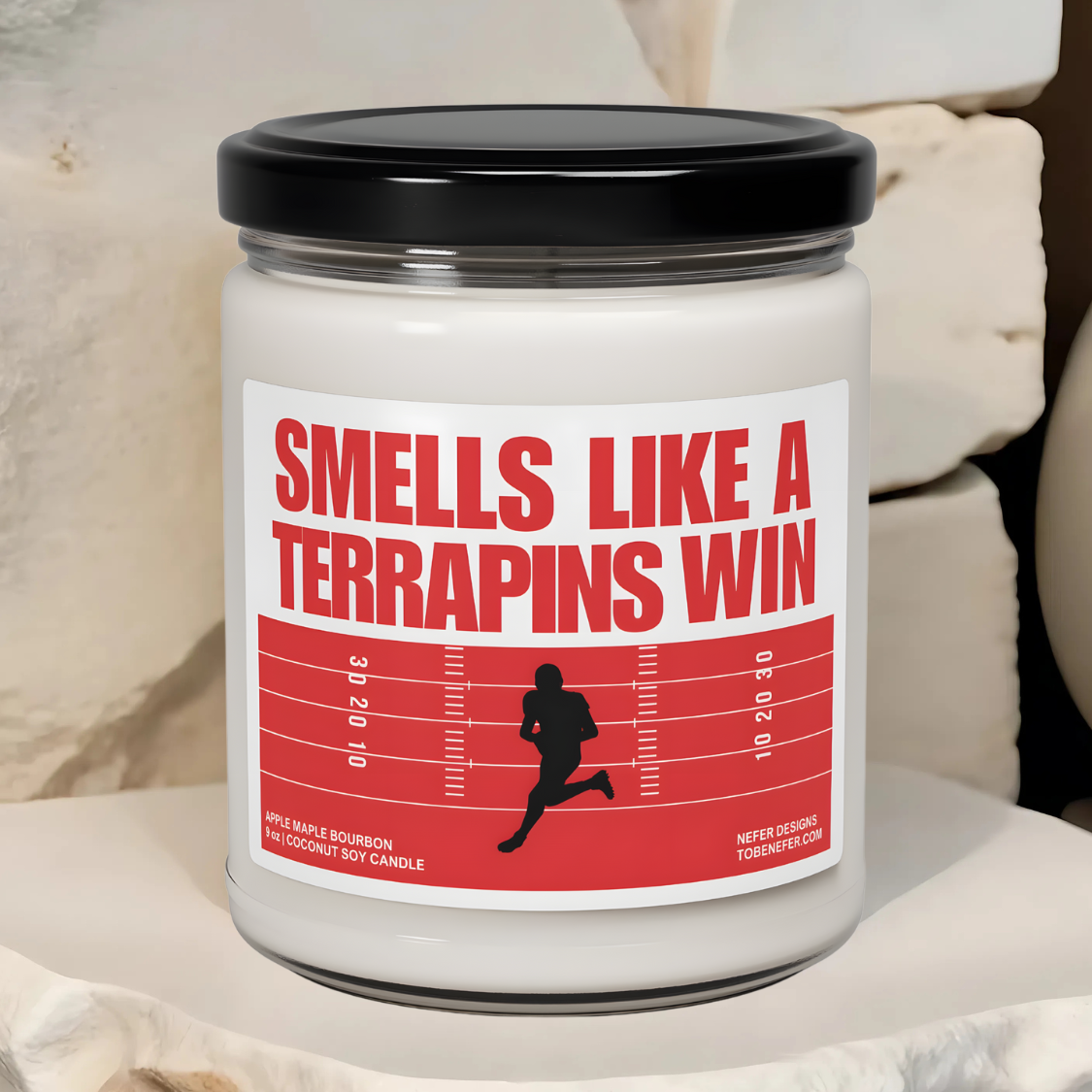 University of Maryland Terrapins football game day candle with the label show casing the team colors