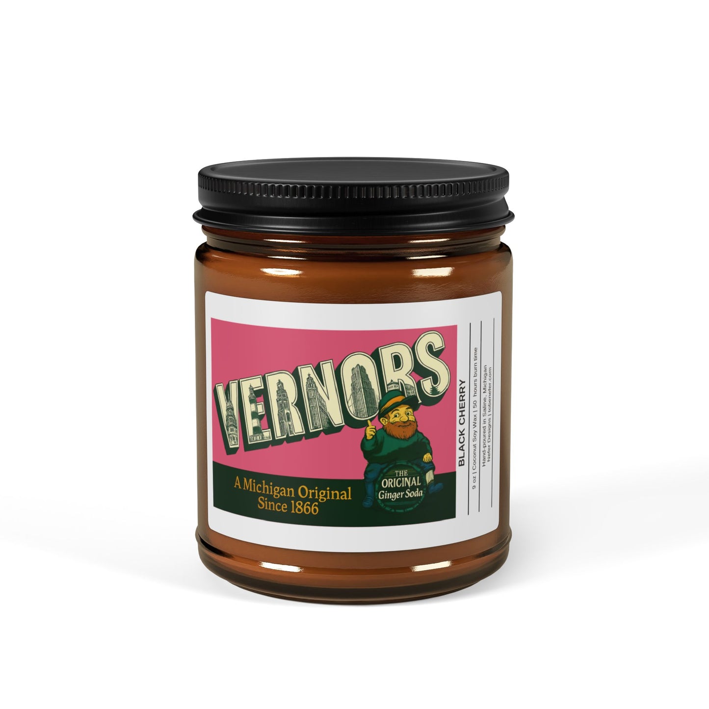 Vernors black cherry scented candle in an amber jar with label on a white background