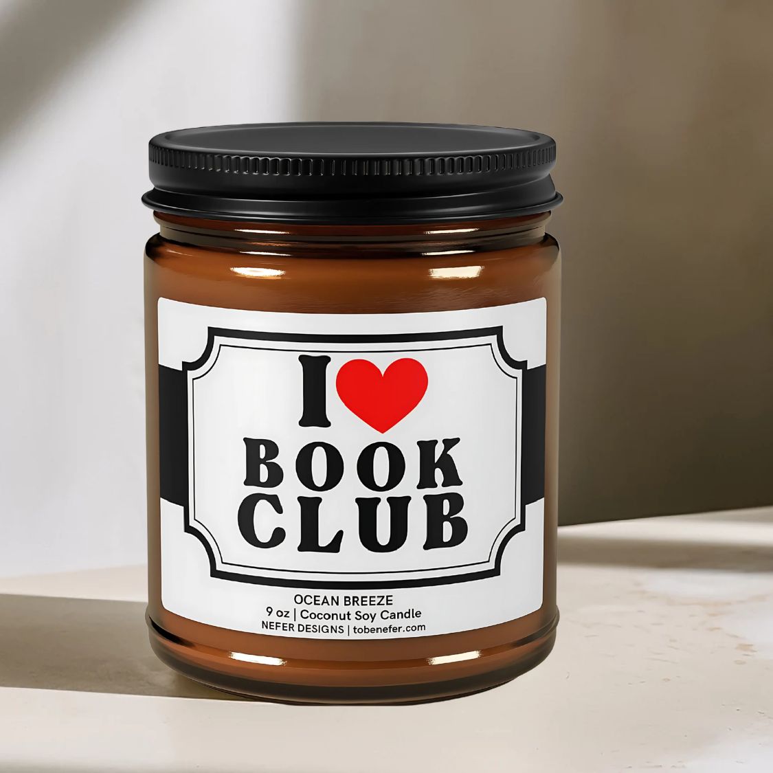 i love Book Club Ocean Breeze scented candle - eco-friendly coconut soy wax in 9 oz amber jar, ideal for bookish decor and reader gifts.
