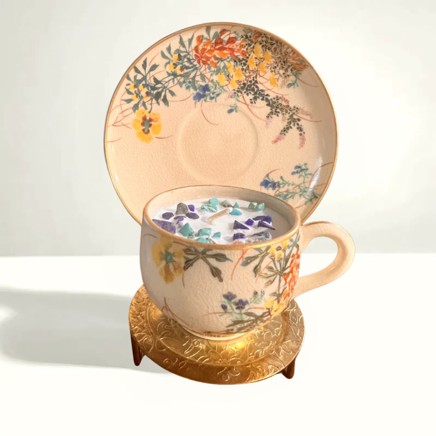 Nakayama porcelain teacup and saucer featuring intricate hand-painted design with floral or geometric patterns in vibrant colors