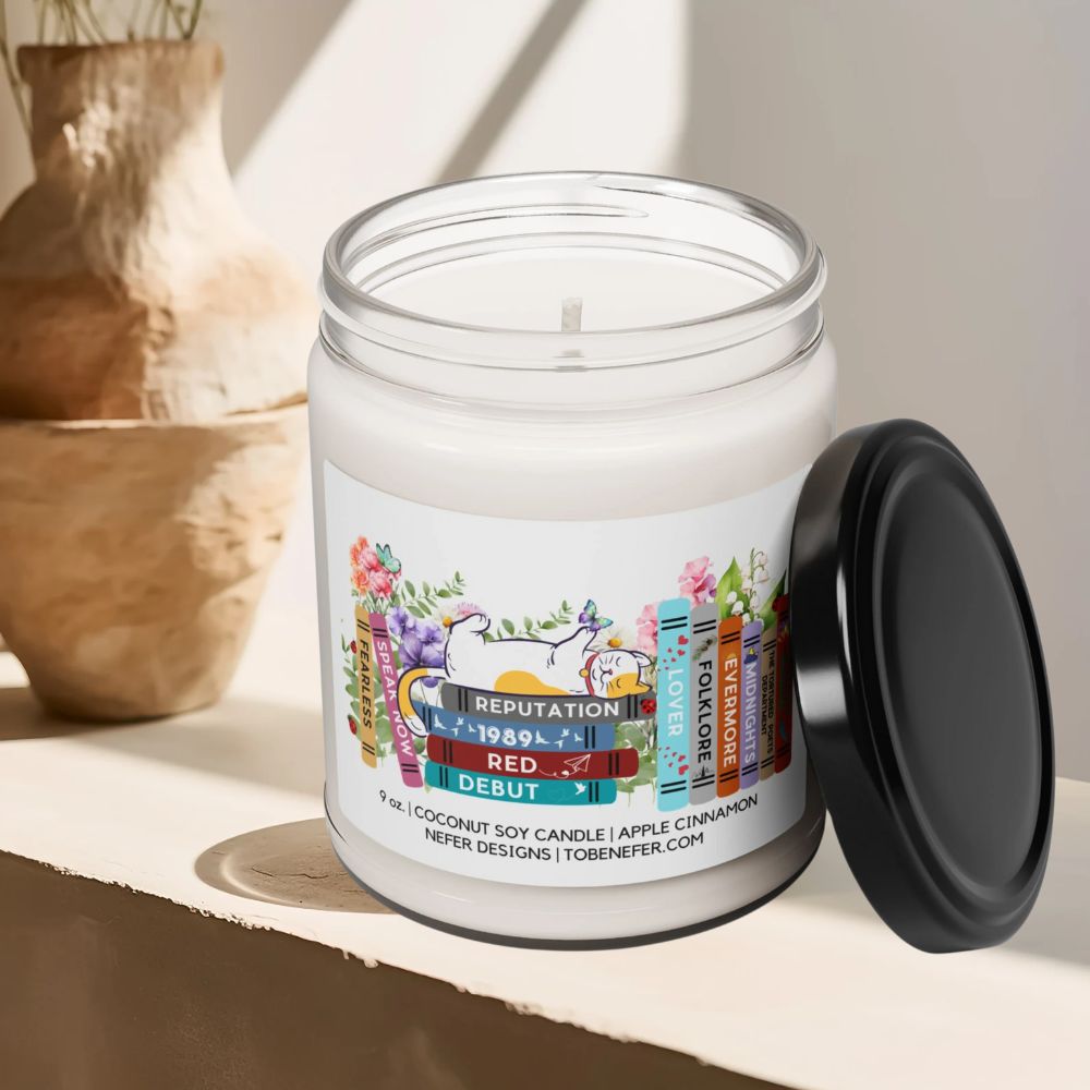 Candle in a jar with a colorful label on a neutral background