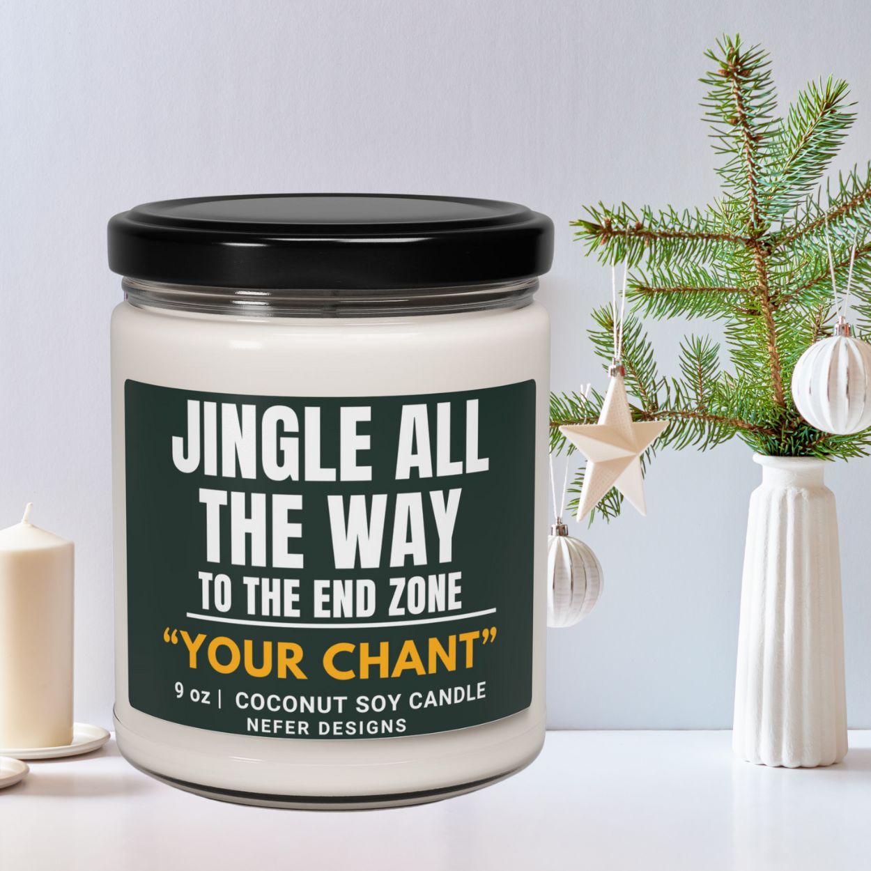 Candle jar with 'Jingle All The Way' text and Christmas decorations in the background