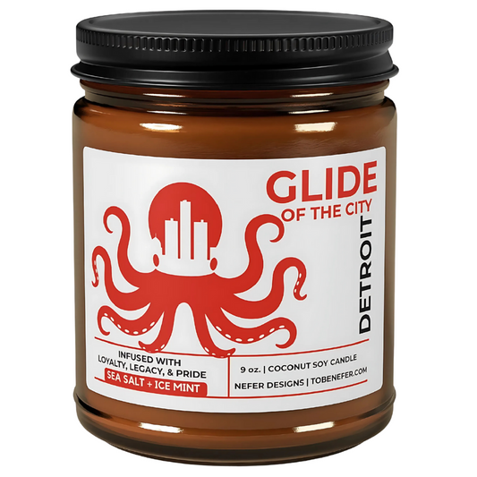 Jar of 'Glide of the City' candle with red octopus design on a white background