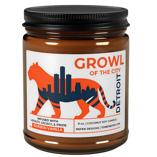 Candle jar with 'Growl of the City' label featuring a tiger and cityscape design.