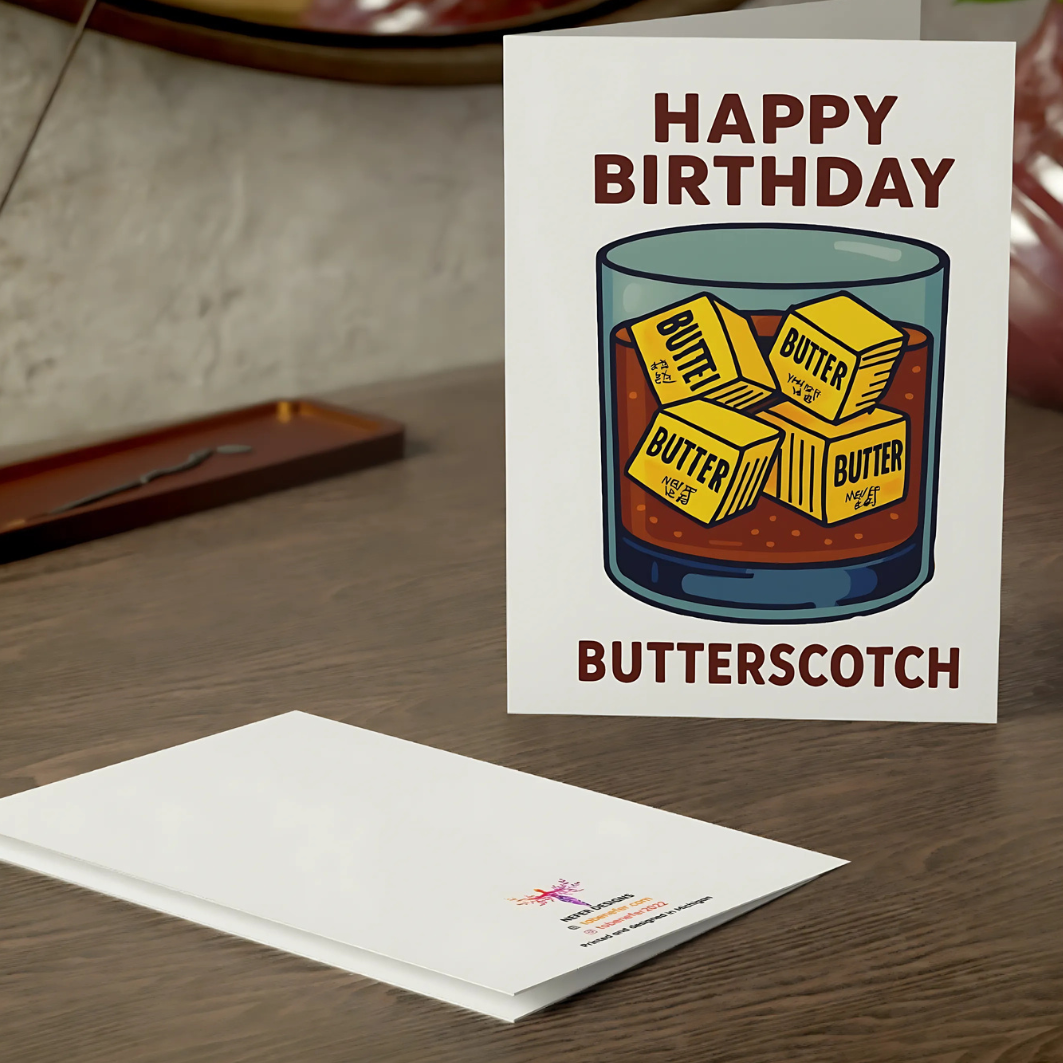 Birthday card with butterscotch illustration and envelope on a wooden surface