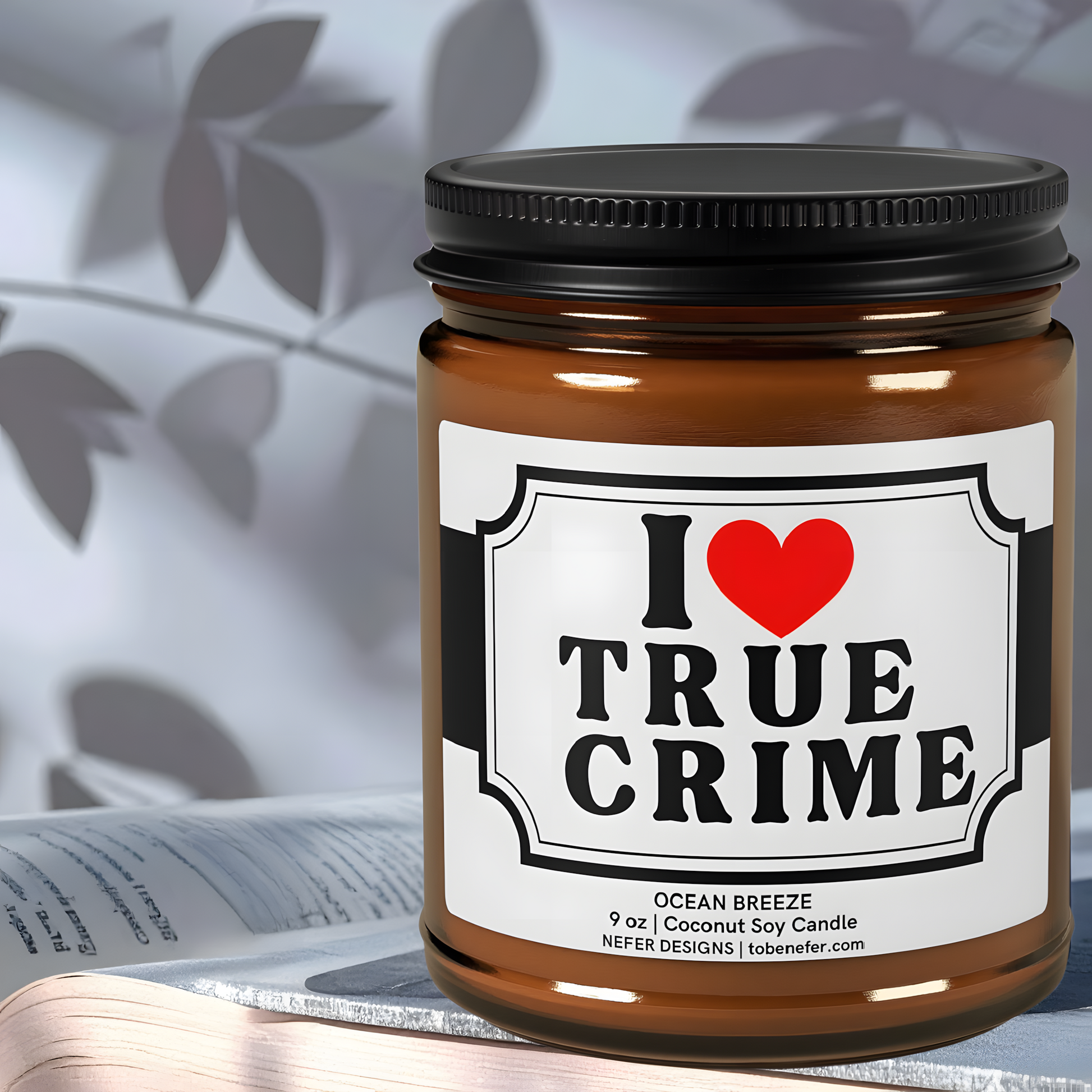 Cozy reading setup with a true crime-themed soy wax candle in an amber jar, ideal for bookworms and thriller fans.