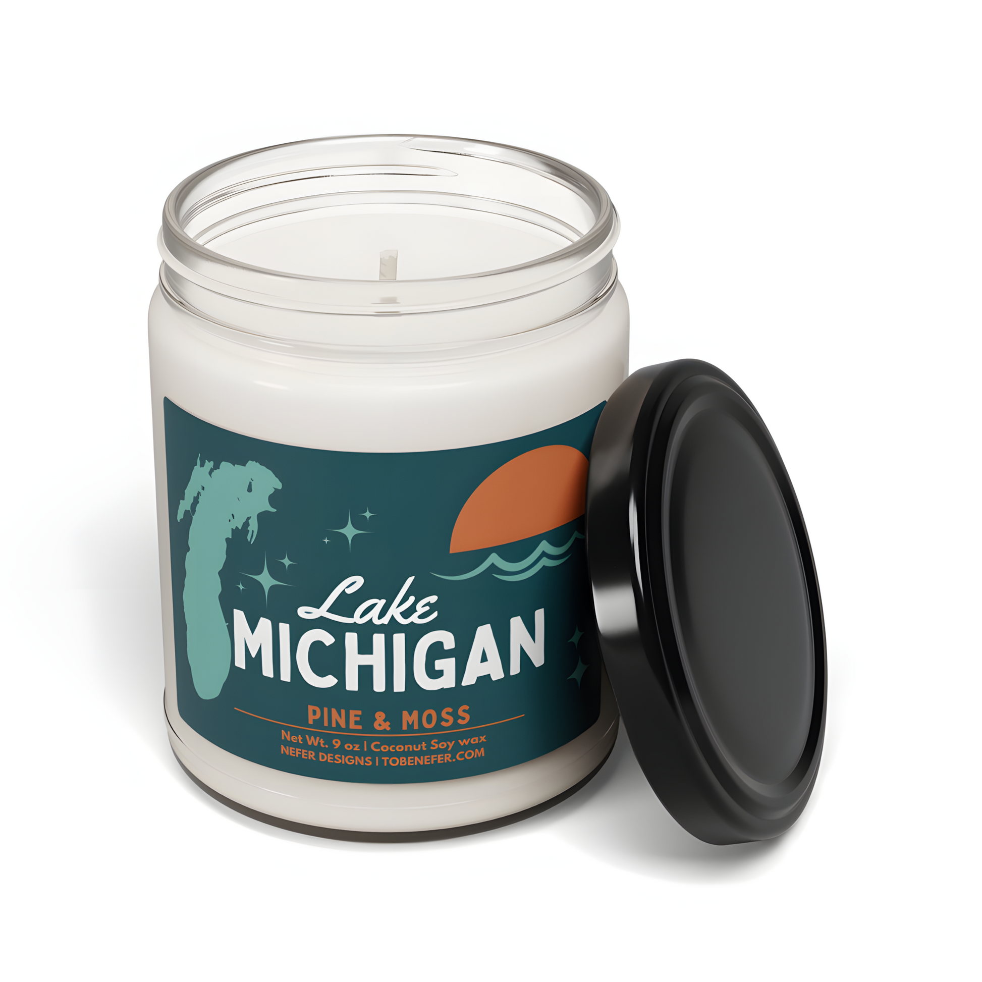 Alternative angle of the 'Lake Michigan' candle showing the full label with 'Pine & Moss' fragrance details, 9 oz net weight