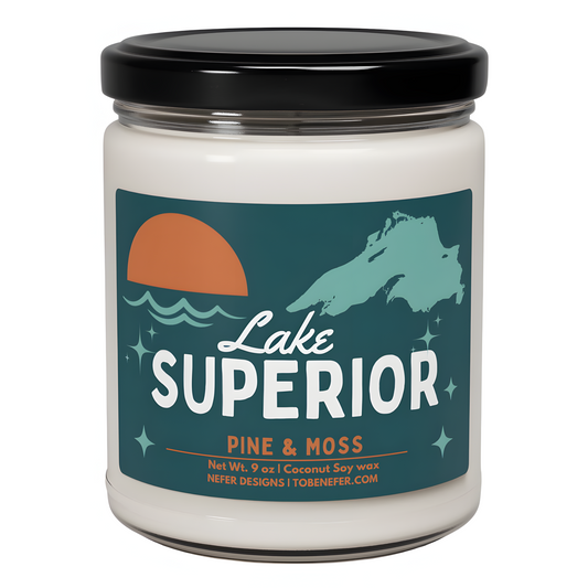 A second view of the 'Lake Superior' candle by Nefer Designs, featuring 'Pine & Moss' fragrance. Details include coconut soy wax, 9 oz net weight
