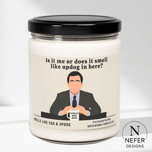 The office show themed candle  with a witty and funny saying with the cxartoon image of micheal scott. 