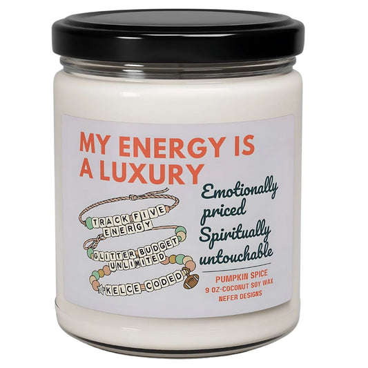 Jar of candle with a label reading 'My Energy is a Luxury' on a white background