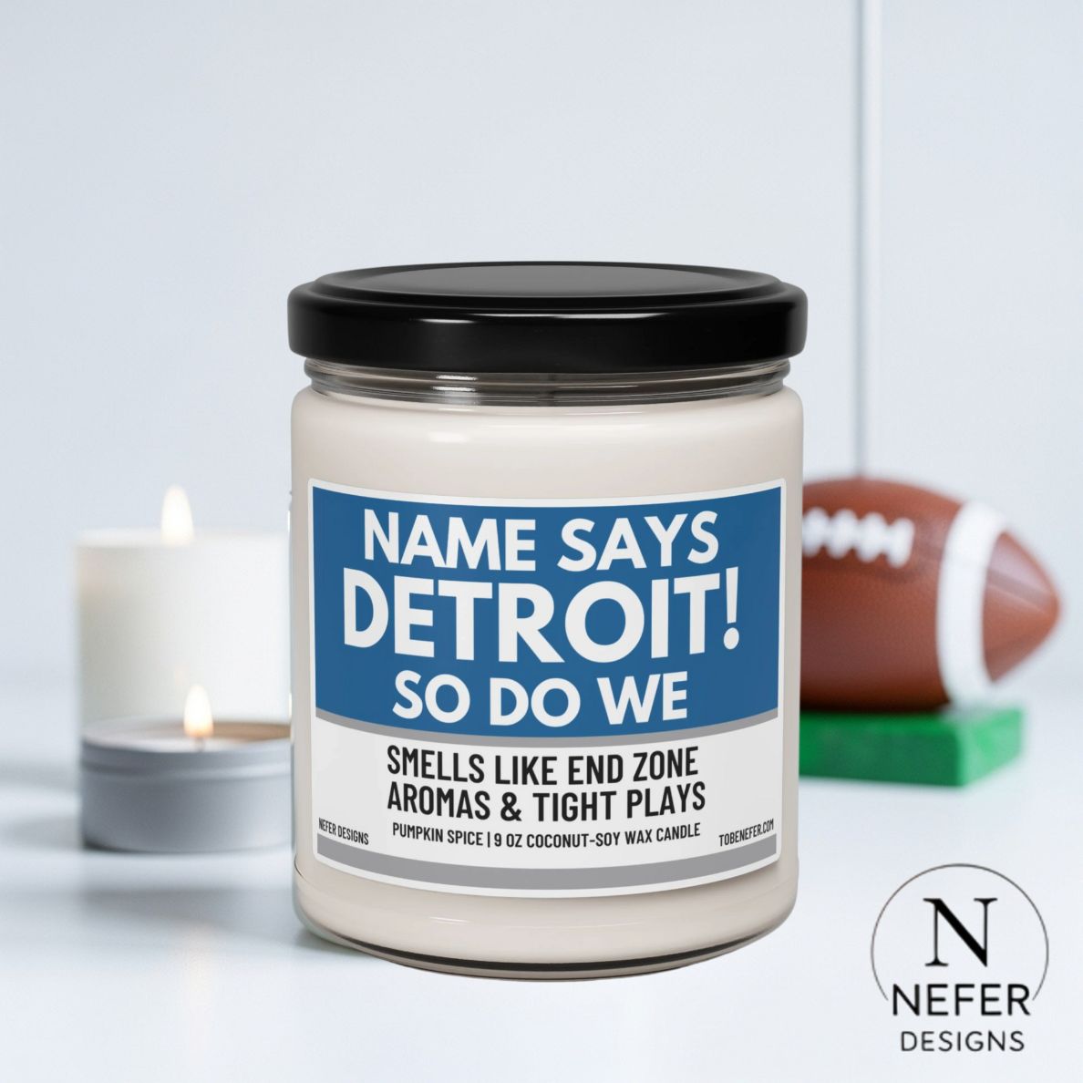 Candle jar with 'Name Says Detroit! So Do We' label, football, and candle in the background.