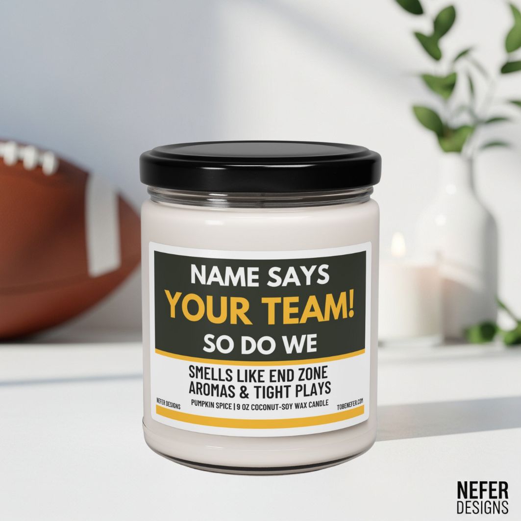 Candle jar with a label indicating team affiliation and scents, on a surface with sports-themed decor.