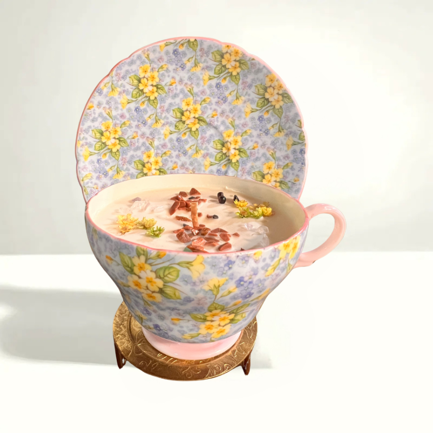 Collectible Shelley primrose teacup candle - 1940s pastel floral bone china with gold edges, featuring lemongrass violet scented soy wax