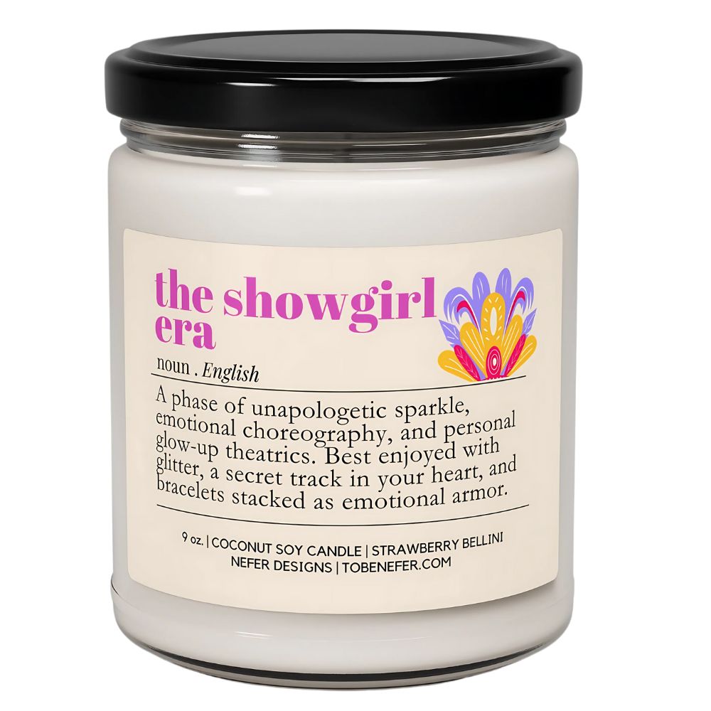 Candle jar with a label featuring the text 'the showgirl era' and colorful design.