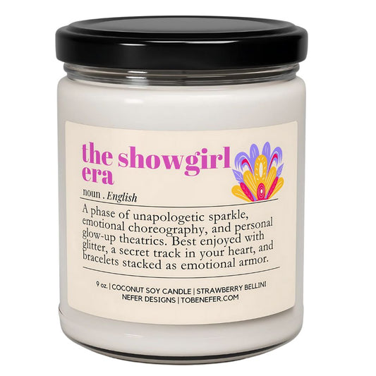 Candle jar with a label featuring the text 'the showgirl era' and colorful design.
