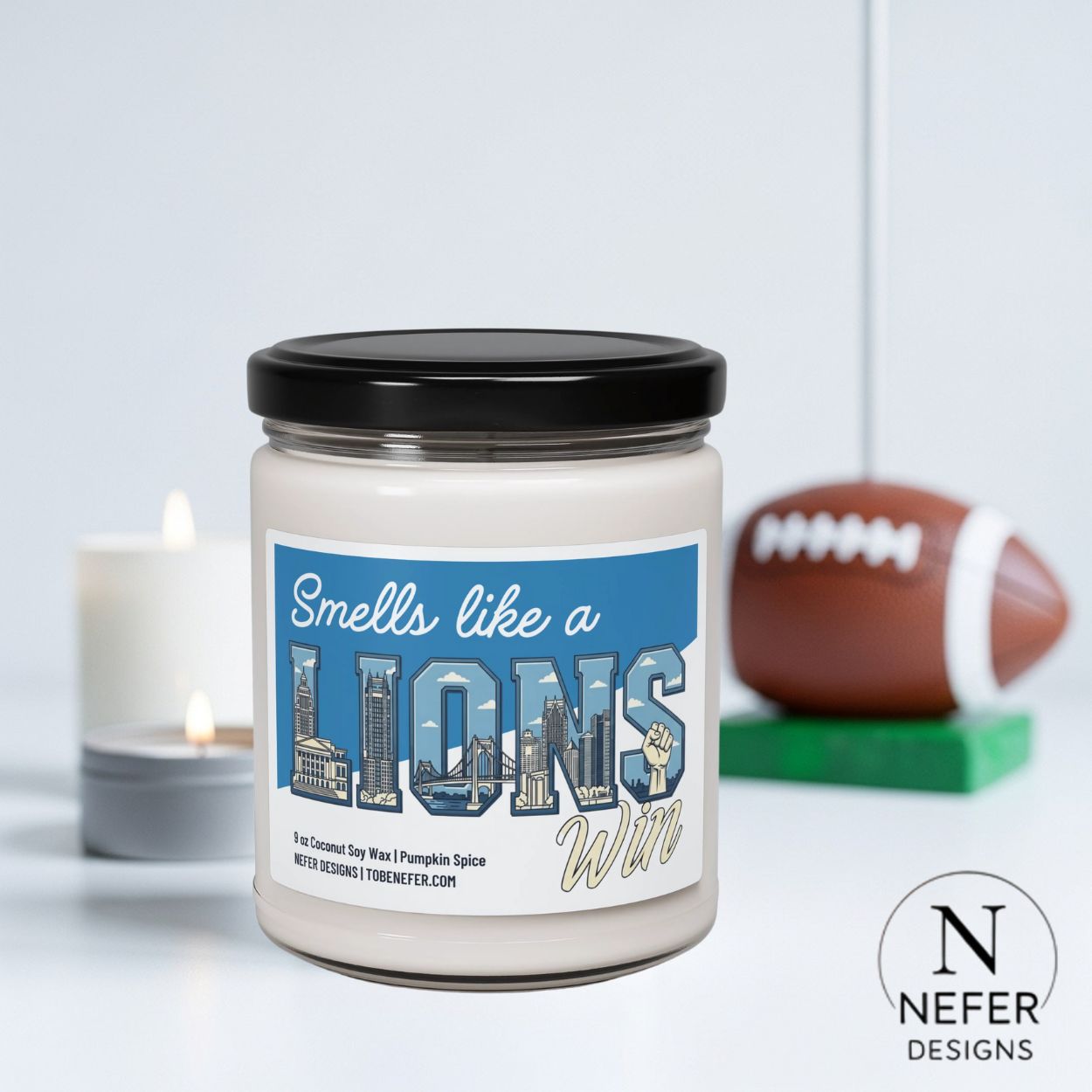 Candle jar with 'Smells like a Lions' label, football in the background