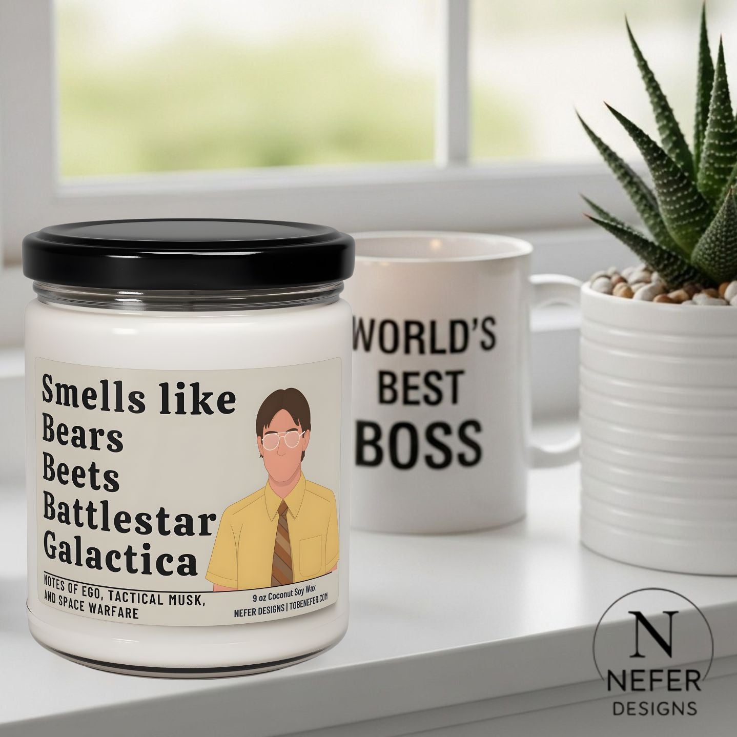 Jar labeled 'Smells like Bears Beets Battlestar Galactica' and a mug with 'World's Best Boss' text on a surface.