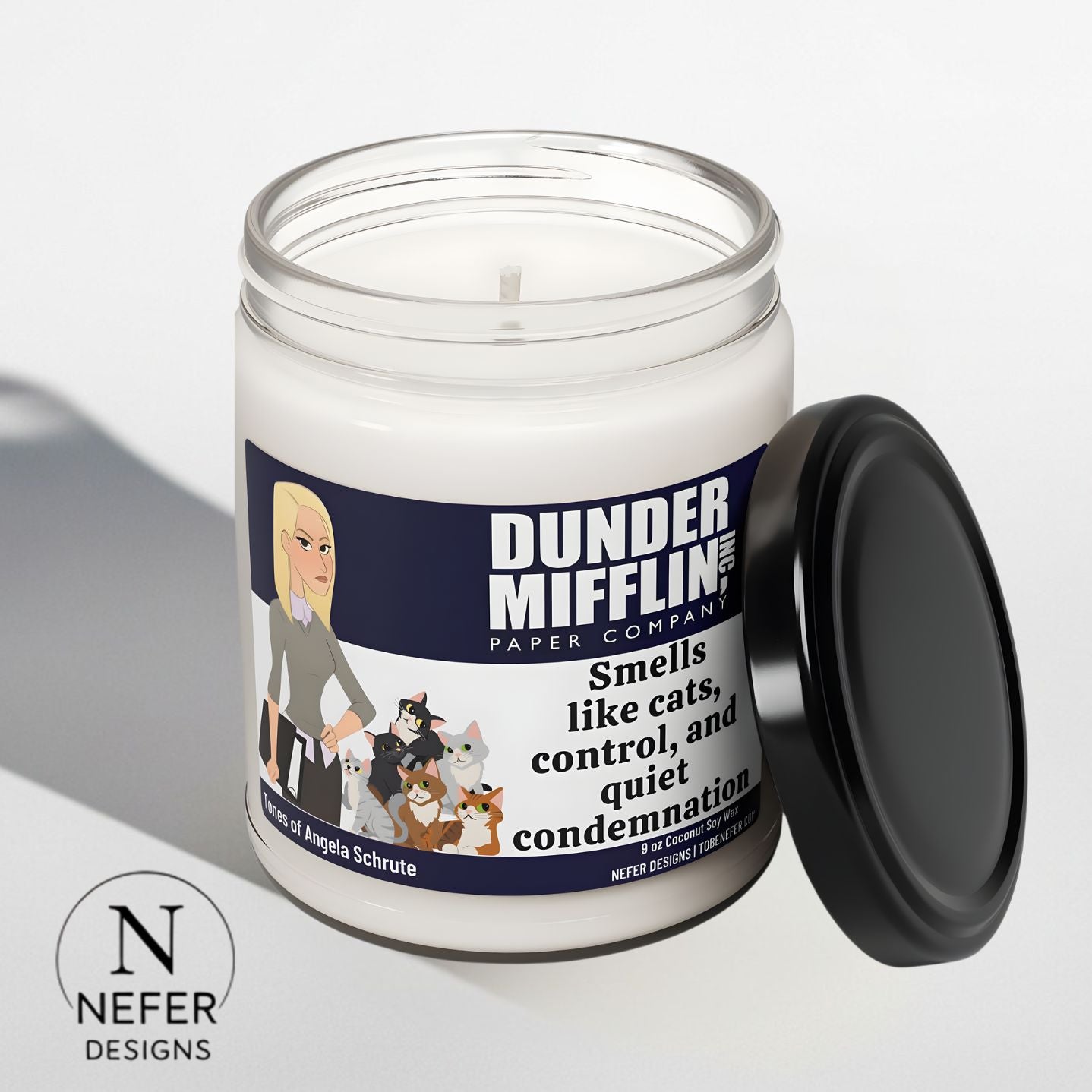Candle with a label featuring characters from 'The Office' and the brand 'Nefer Designs'.