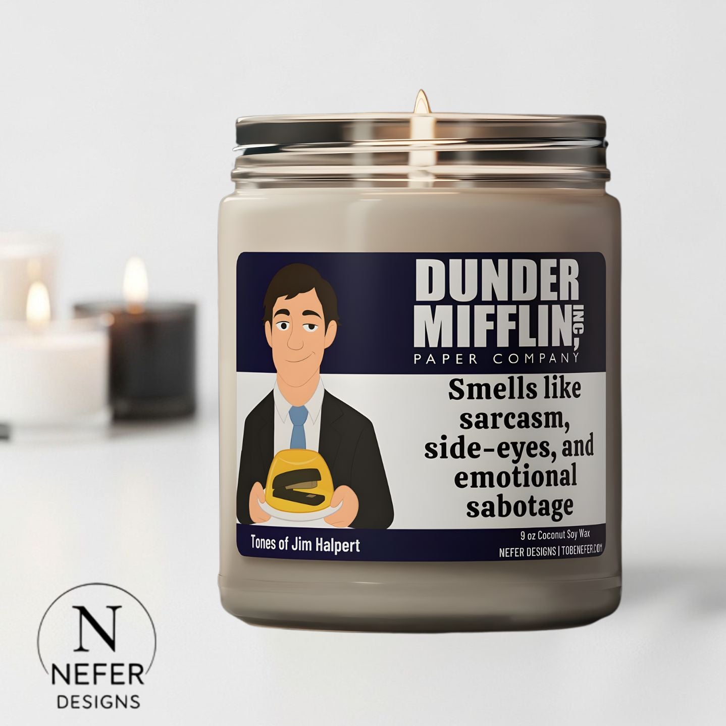 Candle with Dunder Mifflin theme and NEFER DESIGNS branding