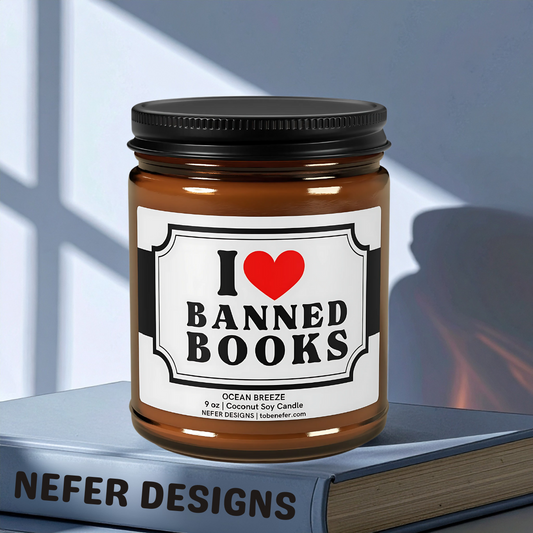 I Love Banned Books soy candle in amber jar styled with classic banned novels and vintage library decor.